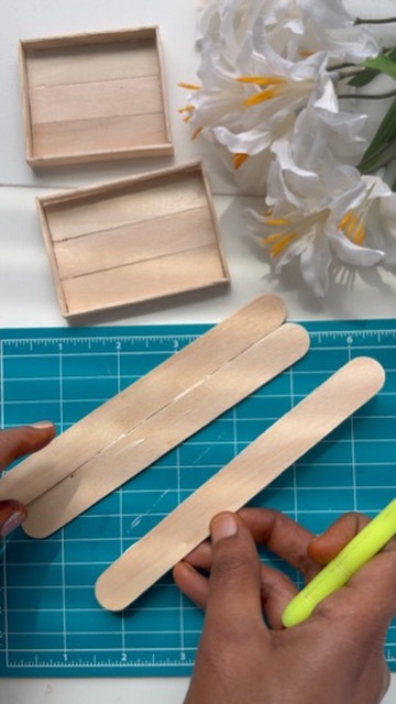 Gluing the sticks into a tray base
