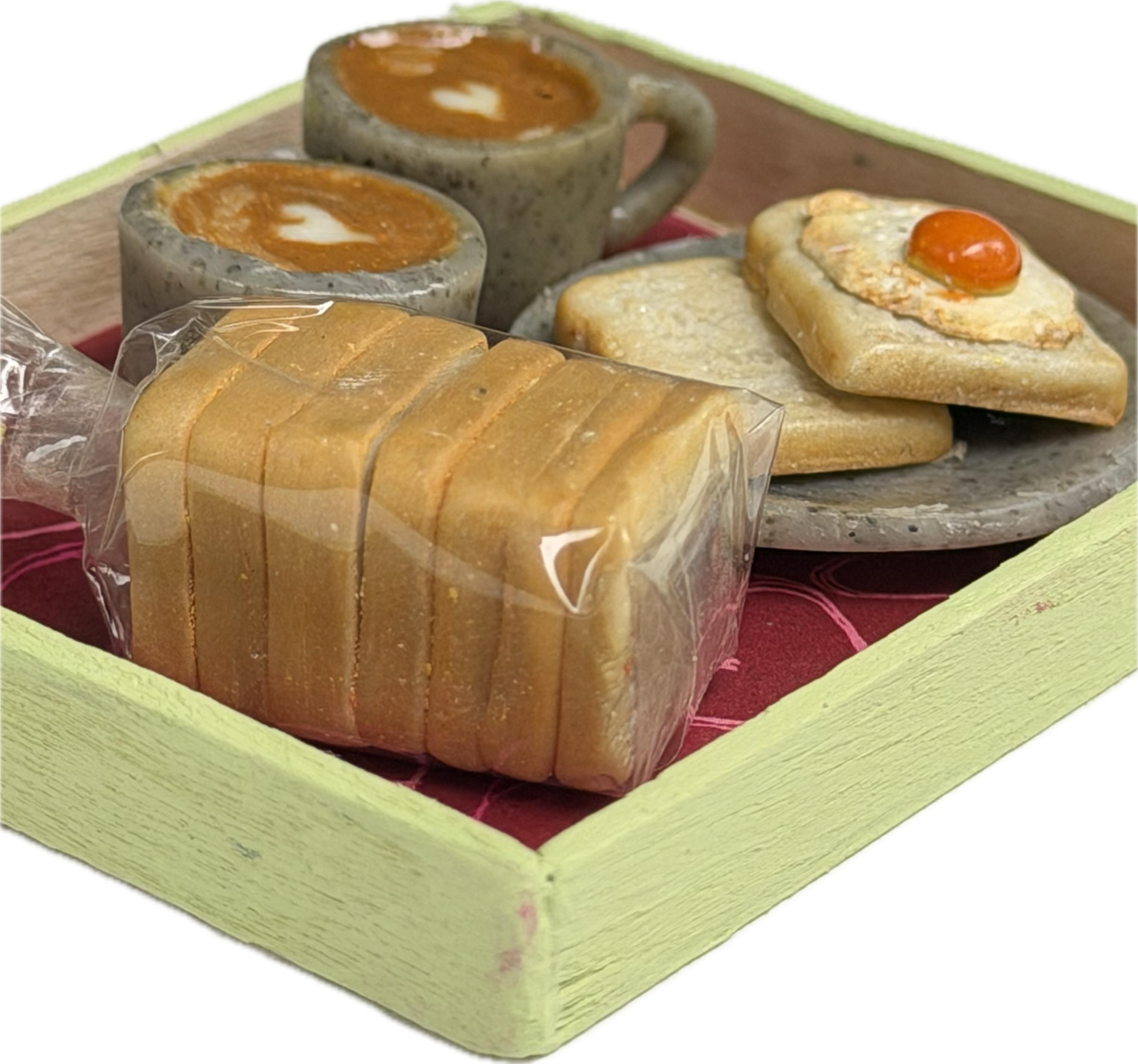 Miniature breakfast tray with coffee cups, bread loaf and toast